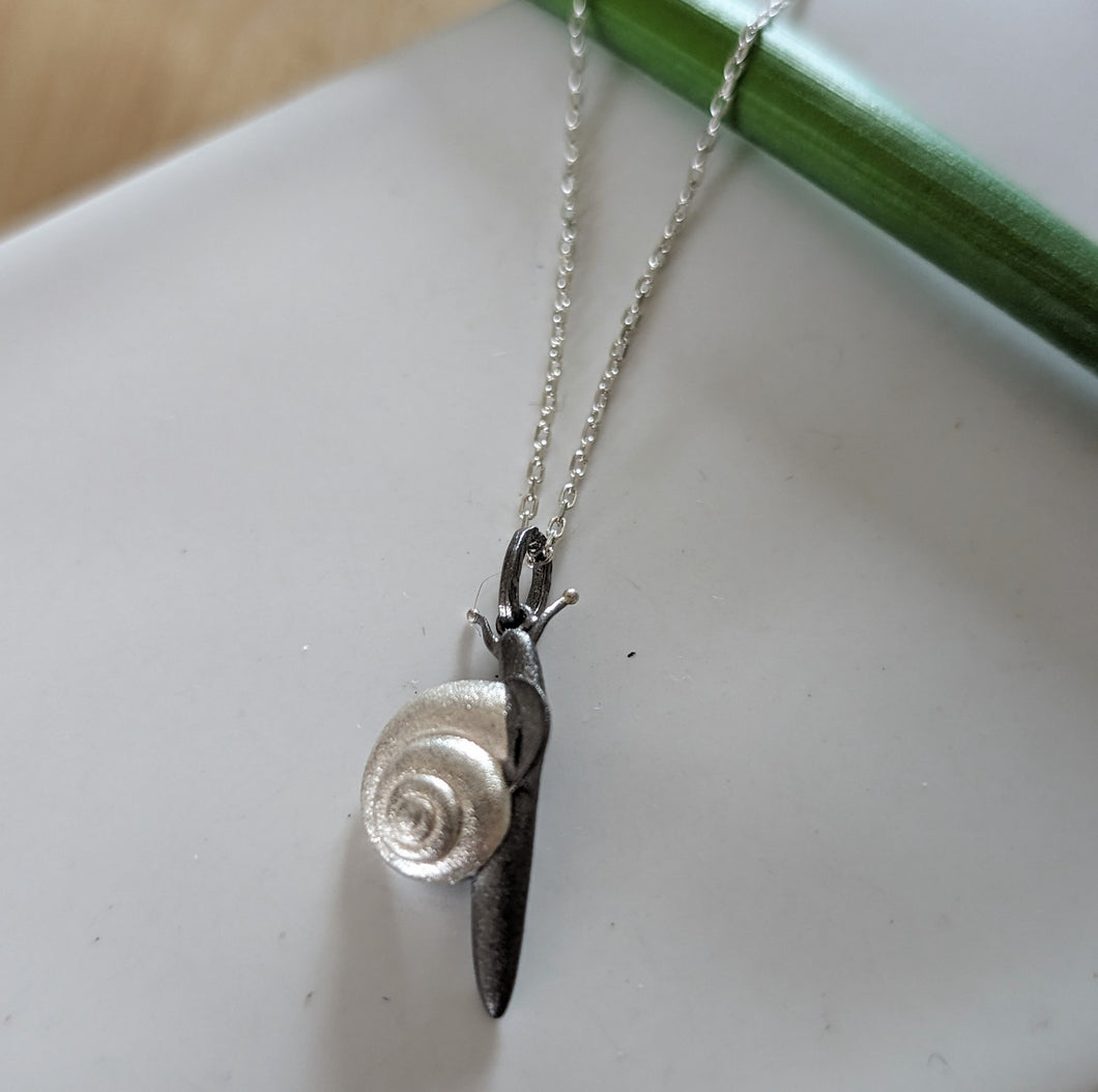 Snail pendants