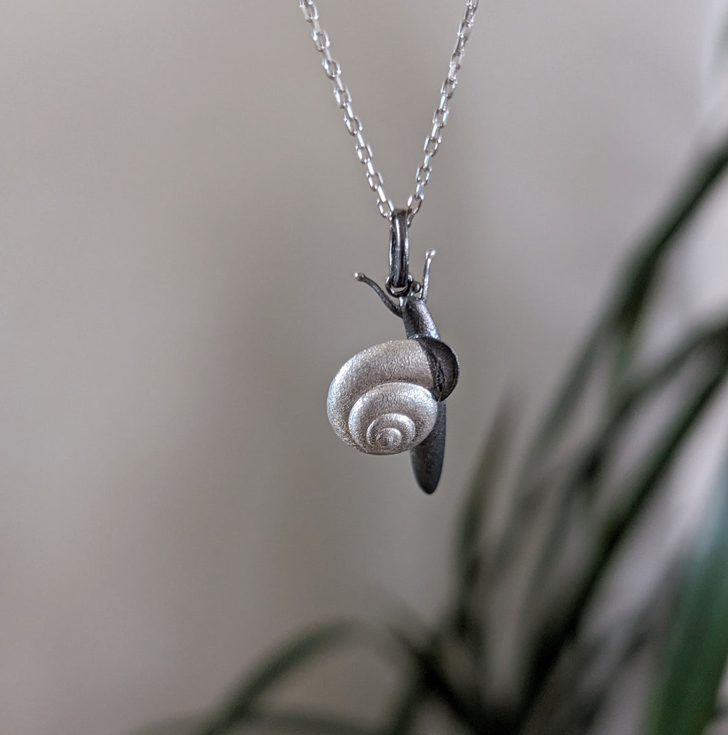Snail pendants